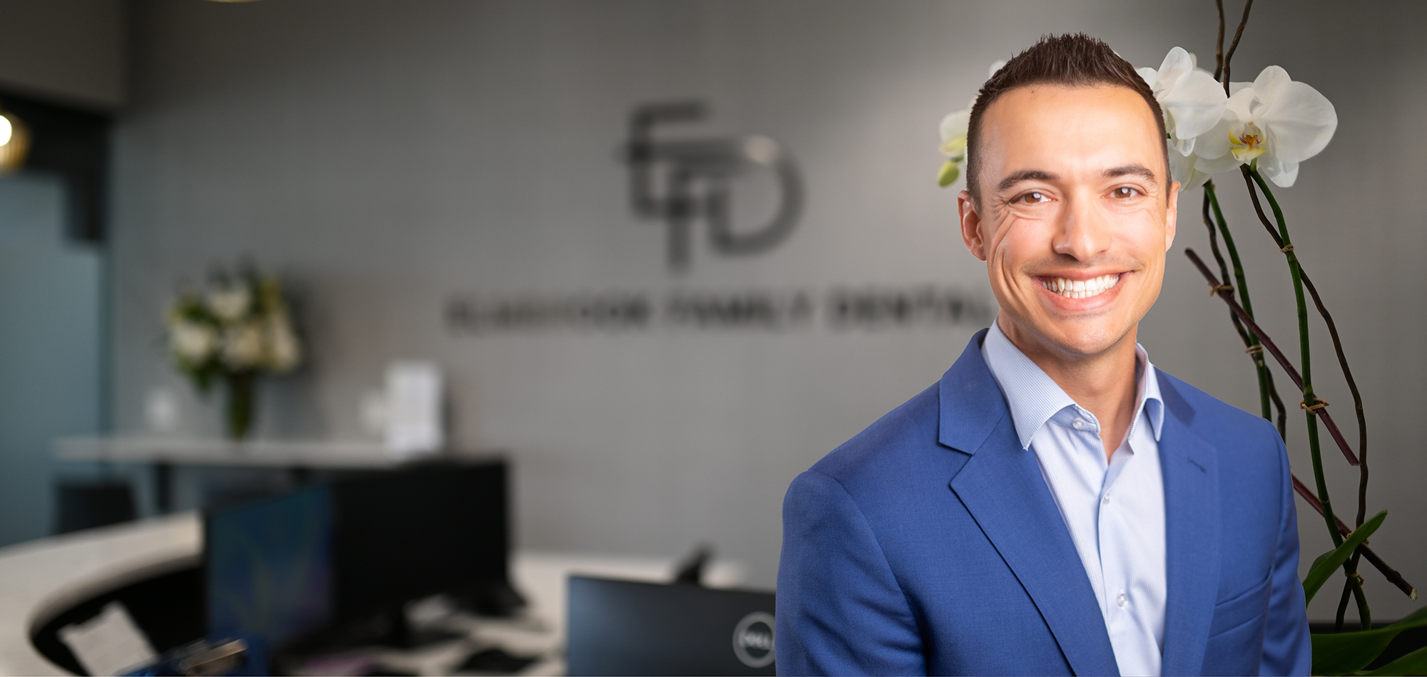 Wauwatosa dentist Doctor Brandon Barrette smiling in dental office