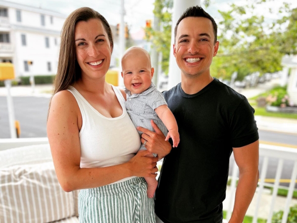 Doctor Barrette and his wife holding their baby