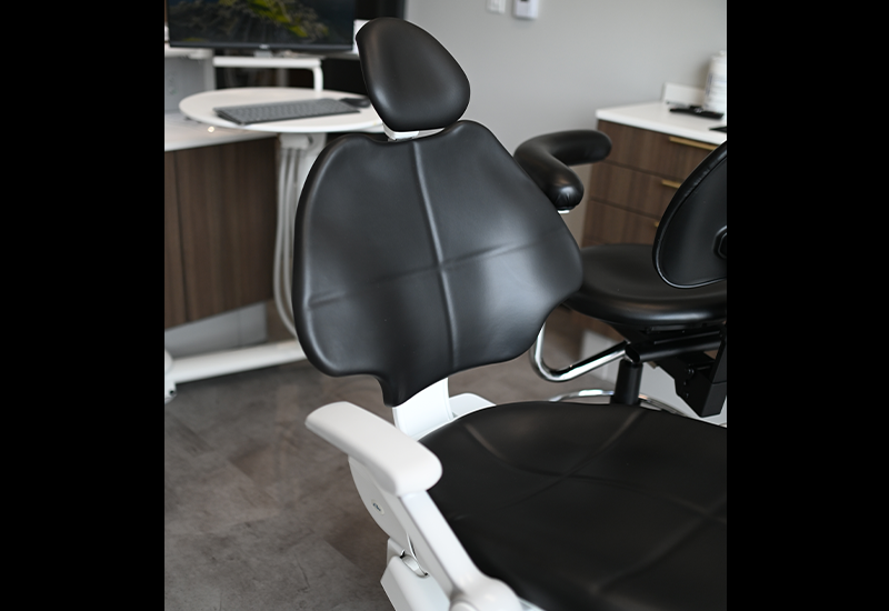 Close up of black leather dental treatment chair