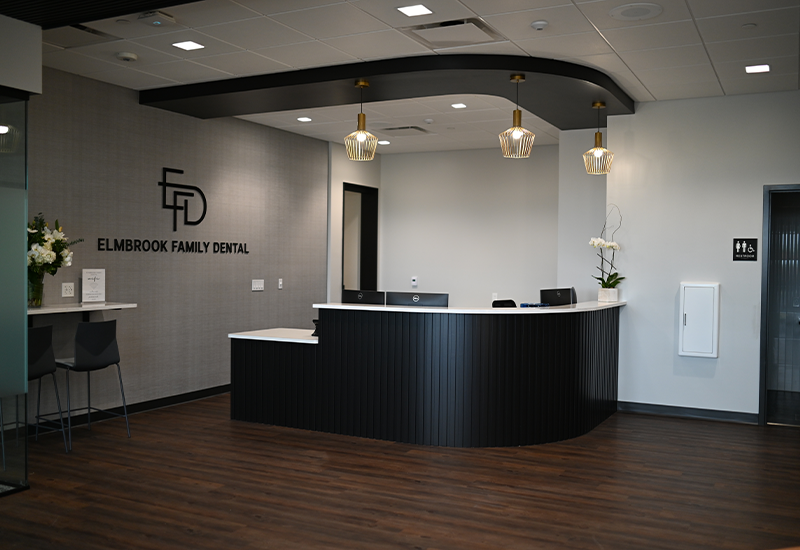 Front desk in open reception area of dental office