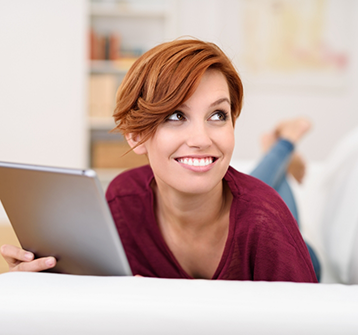 Woman with short orange hair smiling